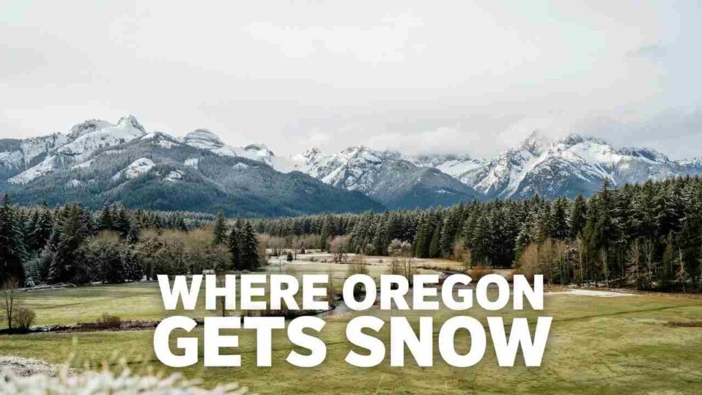 Snow-covered Oregon Cascade Mountains above a lower green valley showing how snowfall changes with elevation